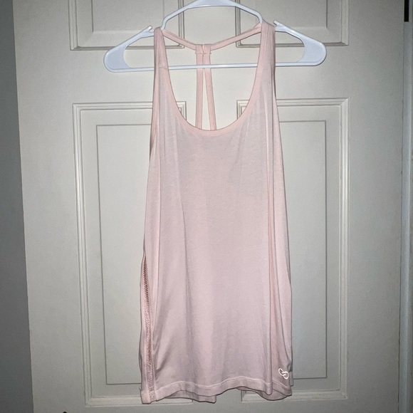 CALIA by Carrie Underwood Tops - 🩷Carrie Underwood’s Calia Size Medium - Pink/Blush cutout details